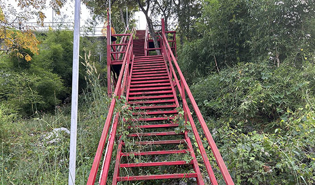 Red staircase at Wat Tham Khao Pun