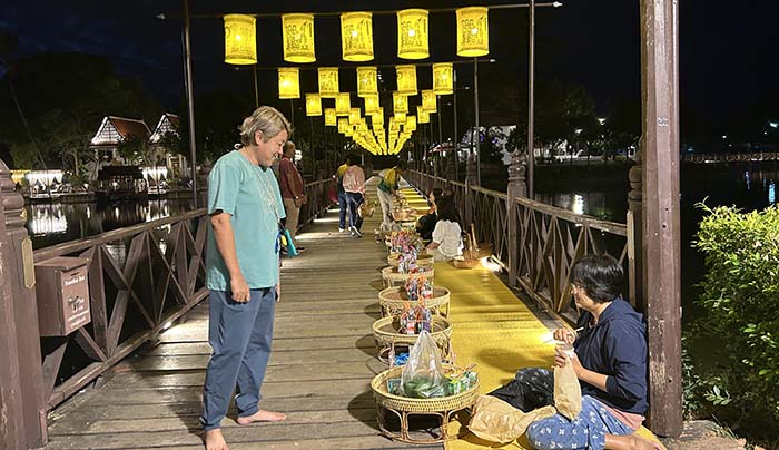 locals choosing seats at the bridge