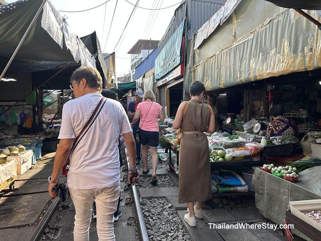 walking along Mae Klong Market