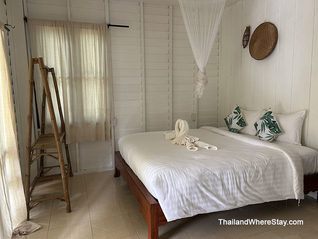 my bed at River Retreat Koh Mak